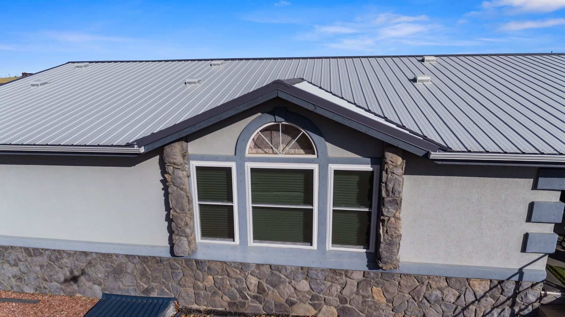 Metal roof installation by Northern Lights Exteriors