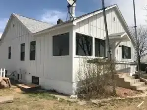 Fort Lupton home with James Hardie Arctic White siding and trim