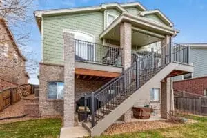 Deckorators deck with railing and stairs installed in Colorado