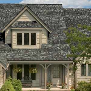 Two-story home with multi-color shingle roofing