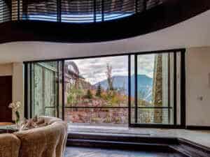 Large sliding windows in a living room area