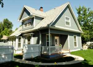 Fort Collins Siding Contractor with newly installed green siding | Northern Lights Exteriors
