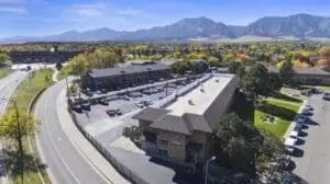 Boulder CO commercial roofing project with asphalt roof installation and roof coating by Northern Lights Exteriors