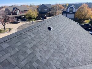 "Northglenn, CO roof replacement after hail damage with durable asphalt shingles installed by Northern Lights Exteriors."