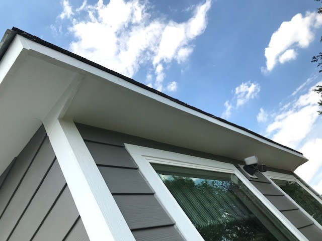 Westminster home with James Hardie siding in Aged Pewter and Arctic White trim plus new energy-efficient windows.