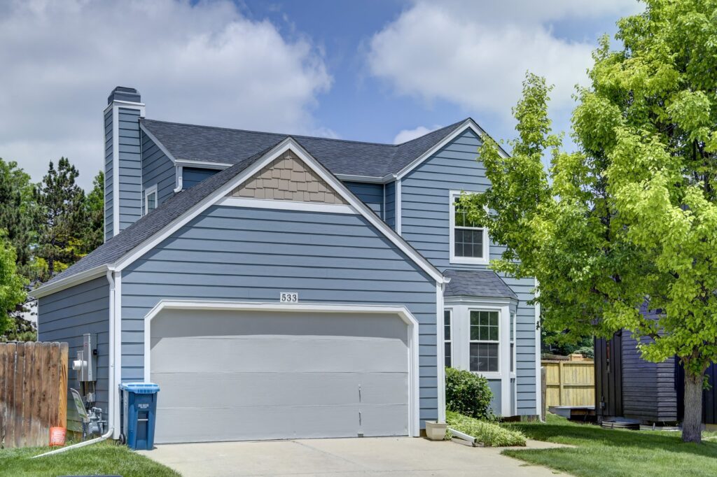 Louisville exterior remodel featuring James Hardie Boothbay Blue lap siding with Arctic White trim