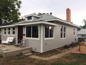 Denver exterior remodel with James Hardie siding and new energy-efficient replacement windows.