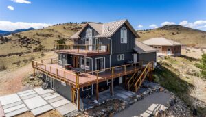 Lyons home exterior remodel with James Hardie Iron Gray siding and Iron Gray trim by Northern Lights Exteriors