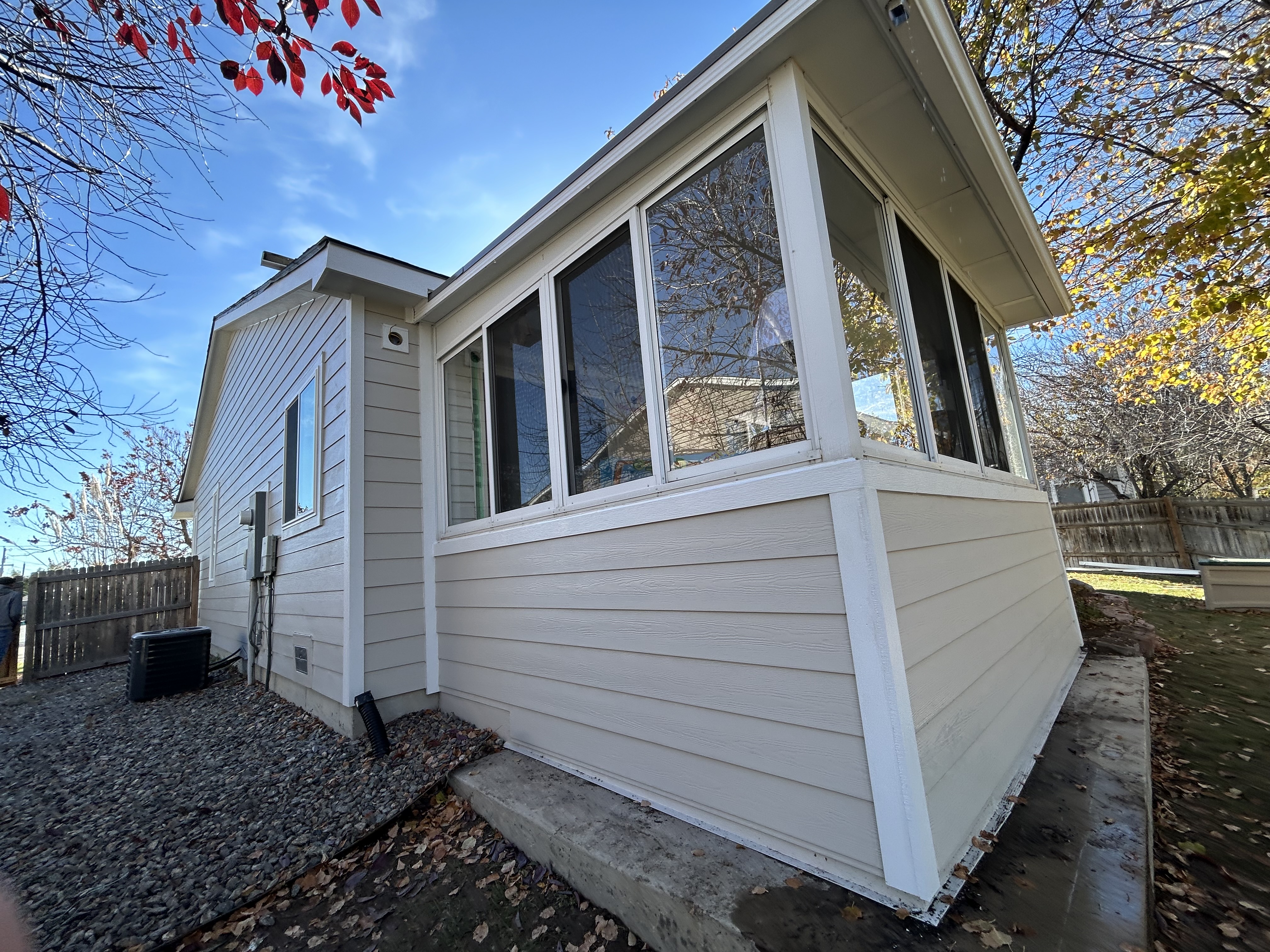 Nearby north metro home with James Hardie siding and replacement windows installed by Northern Lights Exteriors