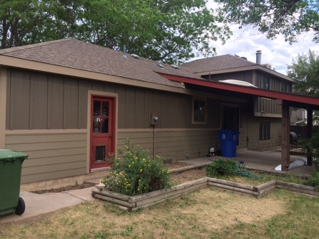 Loveland CO home exterior with James Hardie Dream Collection siding, Khaki Brown, and Timberbark accents installed by Northern Lights Exteriors