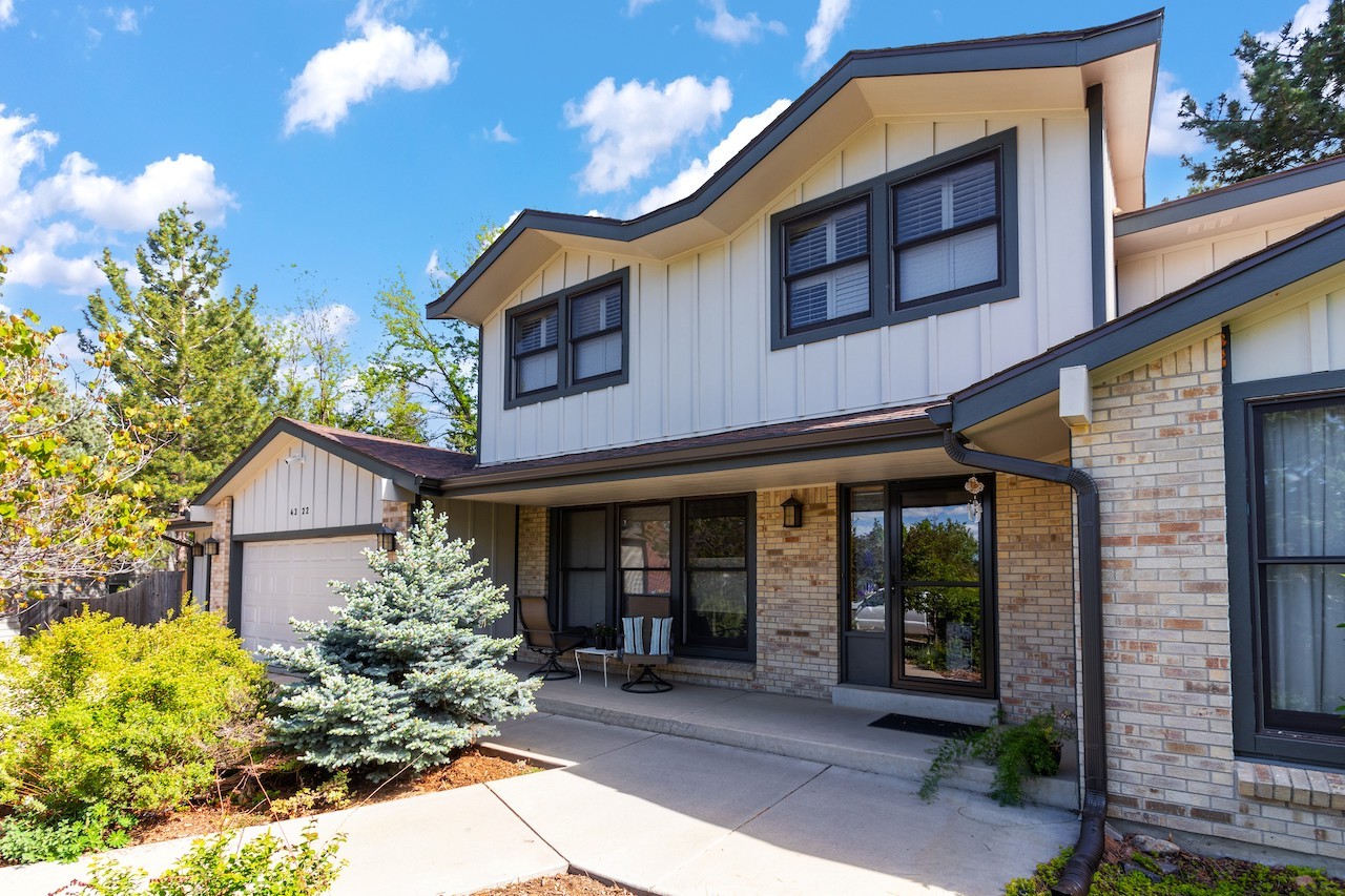Cobblestone James Hardie board and batten vertical siding on a Boulder Colorado home