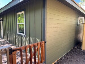 Nederland Siding Home Remodel featuring James Hardie Siding in Moutain Sage with Iron Gray Trim