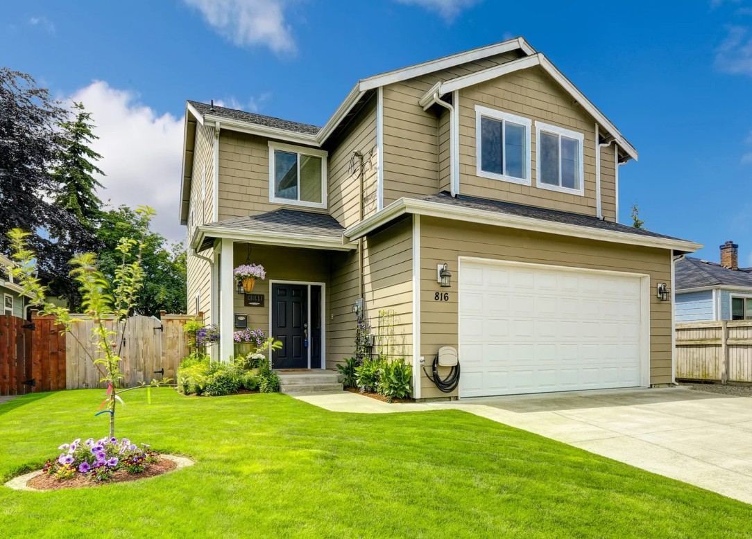 Johnstown exterior remodeling project featuring LP SmartSide siding installation with new replacement windows.