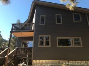 Multi-Trade Nederland Siding Installation Including James Hardie Siding in Rich Espresso & Timberbark Trim