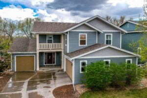Lafayette home with James Hardie Gray Slate siding, Pearl Gray gable accents, and Arctic White trim