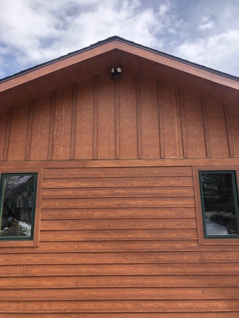 Golden, CO home in Lakota Hills with new windows and James Hardie WoodTone siding by Northern Lights Exteriors
