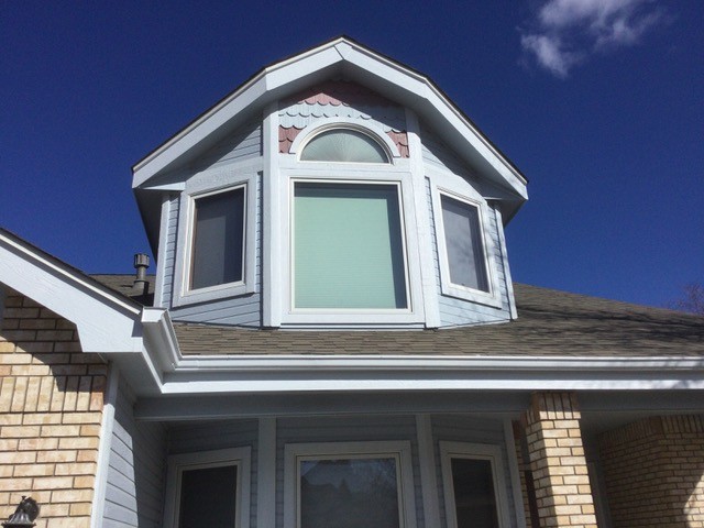 Craftsman-style replacement windows installed on a Fort Collins Colorado home