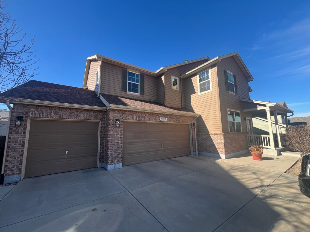 Energy-efficient vinyl replacement windows installed on a Firestone Colorado home by Northern Lights Exteriors