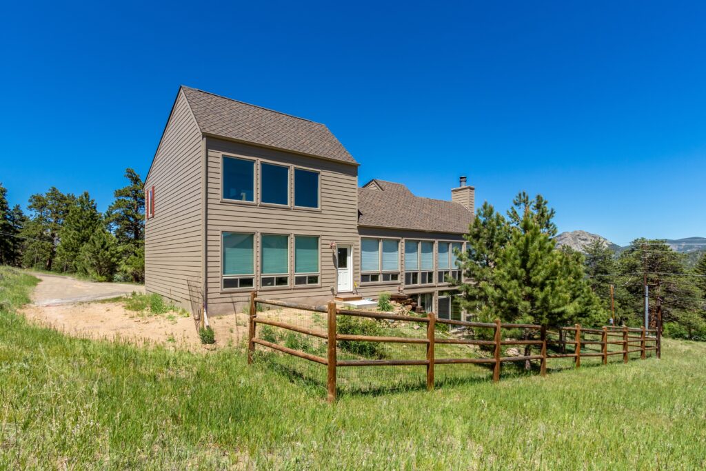 Custom casement replacement windows framing mountain views in Estes Park Colorado