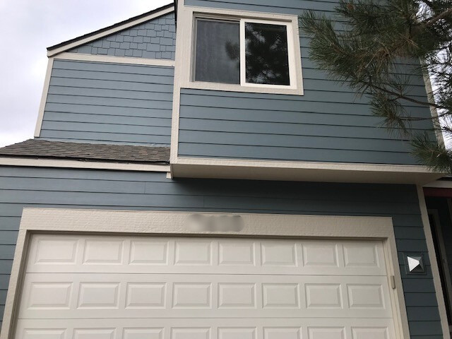 Broomfield home with James Hardie Boothbay Blue siding, Cobblestone trim, and Boothbay Blue shingle accents installed by Northern Lights Exteriors