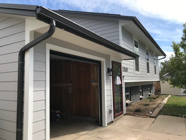 Louisville CO James Hardie Pearl Gray siding and Arctic White trim installed by Northern Lights Exteriors