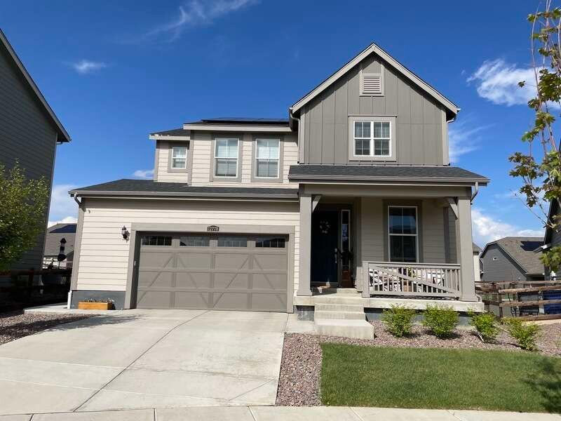 Nearby Longmont home restored after hail damage with new vinyl replacement windows by Northern Lights Exteriors