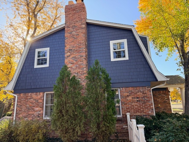 Pella fiberglass replacement windows installed on a Denver metro home by Northern Lights Exteriors