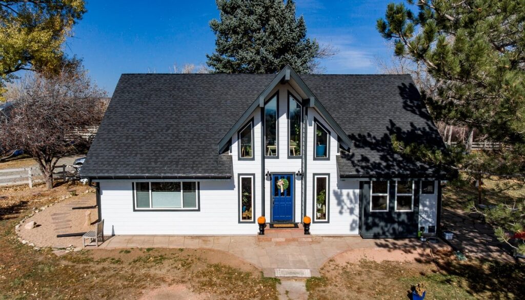 Nearby Colorado home upgraded with new vinyl replacement windows by Northern Lights Exteriors
