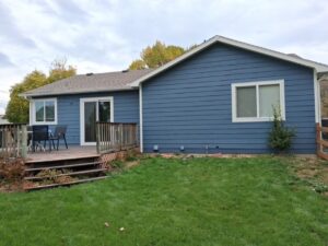 Milliken home remodeled with locally made Anlin vinyl windows as part of a multi-trade exterior project by Northern Lights Exteriors.