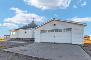 Arctic White James Hardie siding on a Galeton Colorado home exterior remodel by Northern Lights Exteriors