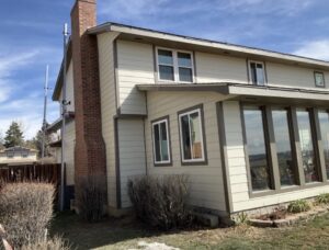 Real Colorado home with James Hardie Navajo Beige siding installed by Northern Lights Exteriors