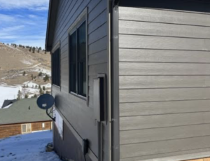 Real Colorado home with James Hardie Rich Espresso siding installed by Northern Lights Exteriors