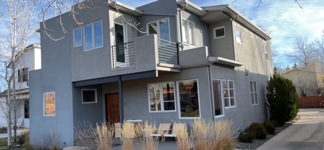 Before view of a Boulder CO home before full siding replacement paint and gutter upgrade by Northern Lights Exteriors