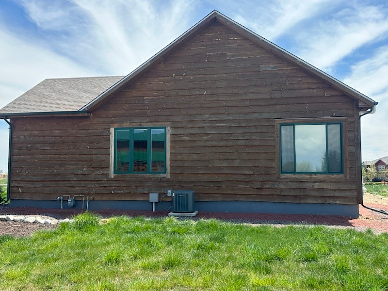 Longmont CO home before James Hardie installed by Northern Lights Exteriors