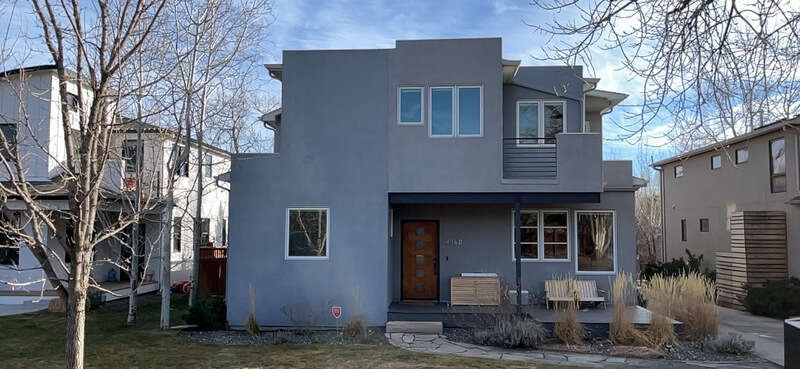 Before photo of a North Boulder CO home prior to James Hardie Artisan V-Groove siding replacement by Northern Lights Exteriors