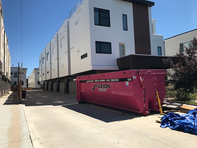 Modern exterior paint on Denver condo remodel with siding windows and roofing by Northern Lights Exteriors