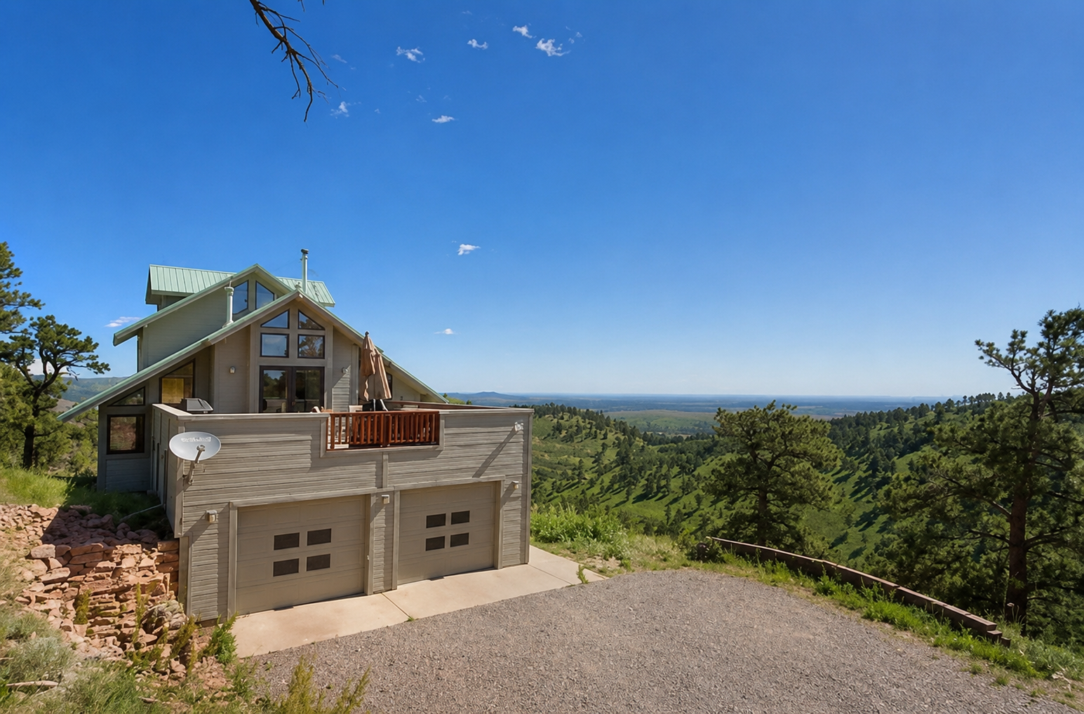 Before photo of Boulder mountain home before James Hardie siding installation by Northern Lights Exteriors