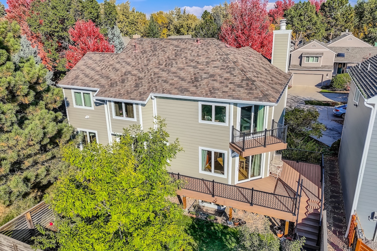 Boulder Colorado Deckorators Mesa composite deck installation with black aluminum railing system installed by Northern Lights Exteriors