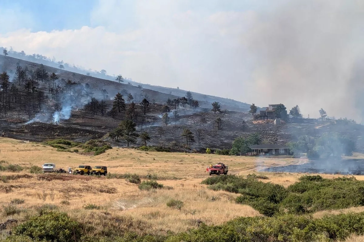 Home protected during the Stone Canyon Fire near Lyons, Colorado after Northern Lights Exteriors installed James Hardie fiber cement siding and fire-resistant exterior components designed to improve wildfire resilience in Colorado's Wildland Urban Interface (WUI).