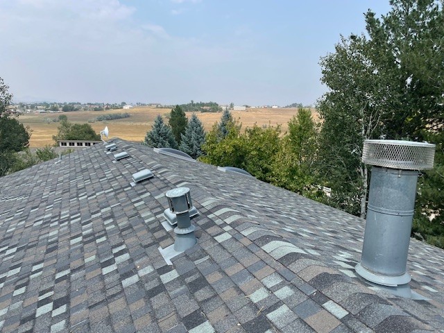 Berthoud, Colorado home featuring a newly installed Owens Corning Class 4 impact-resistant asphalt shingle roof completed by Northern Lights Exteriors after hail storm damage. This roof replacement provides enhanced durability, weather resistance, and long-term protection against Colorado hail, wind, snow, and extreme weather conditions.