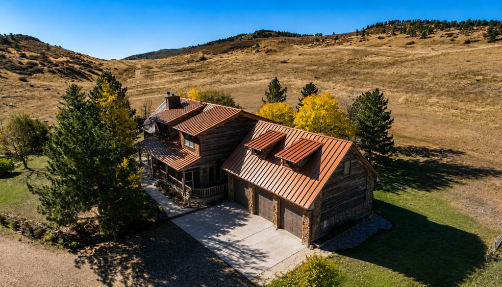 Standing seam metal roof replacement on a home in Berthoud, CO by Northern Lights Exteriors