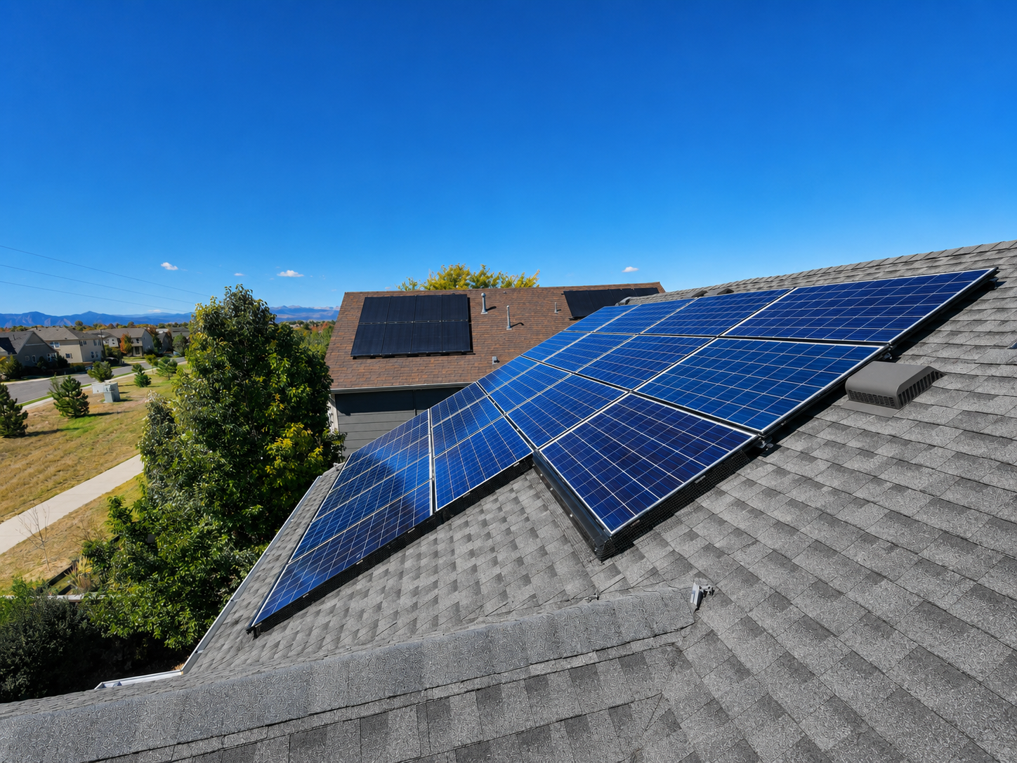 Erie, Colorado roof replacement with impact-resistant shingles and a solar panel detach-and-reset completed under an insurance claim