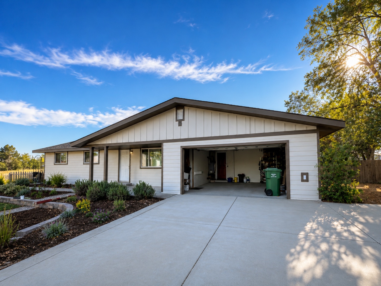 Berthoud, Colorado home featuring James Hardie fiber cement lap siding with vertical board and batten gable accents installed by Northern Lights Exteriors.