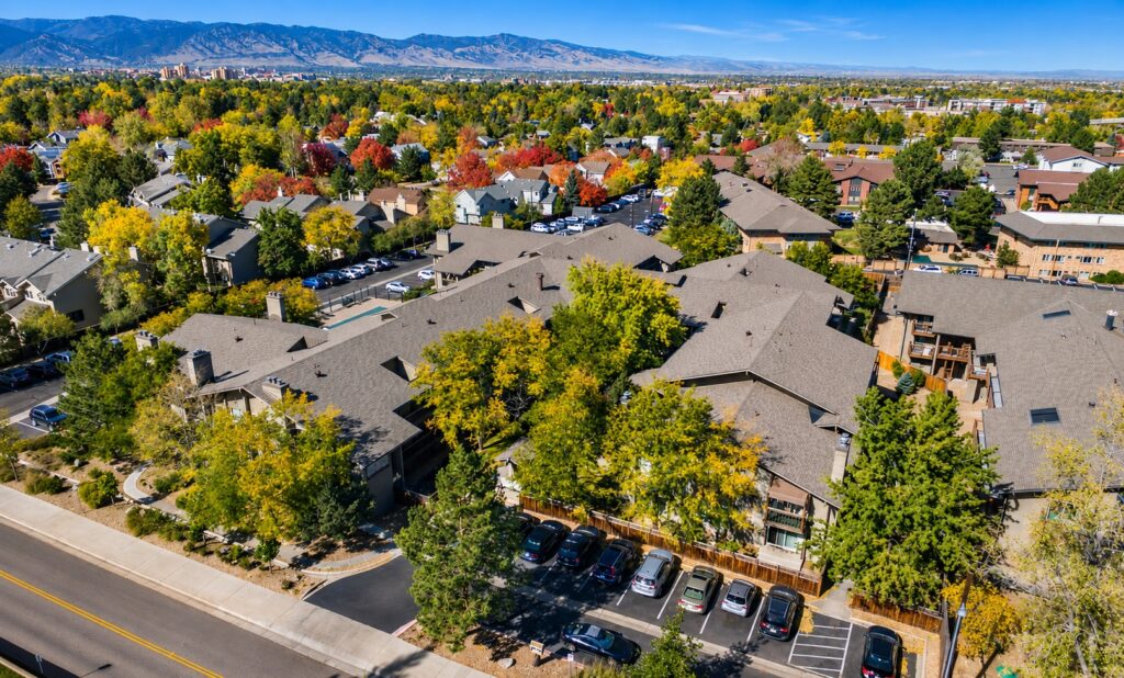 Aerial view of a Boulder multi-family community during roof replacement