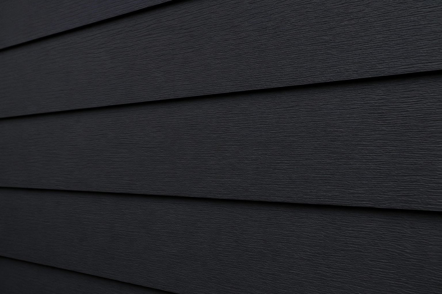 James Hardie Midnight Black fiber cement lap siding close up
