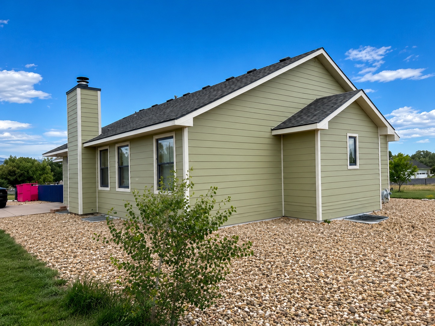 Home featuring James Hardie fiber cement siding with new Pella replacement windows installed by Northern Lights Exteriors. This exterior renovation combines durable low-maintenance siding with premium energy-efficient windows to improve curb appeal, comfort, and long-term performance in Colorado's climate.