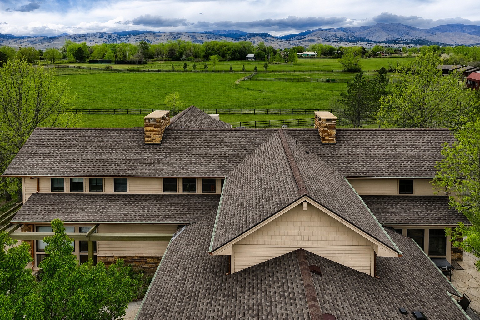 Niwot, Colorado home featuring a new Class IV impact-resistant asphalt shingle roof installed by Northern Lights Exteriors after a Colorado hailstorm. This premium roofing system provides superior hail resistance, enhanced weather protection, and long-term durability while complementing the property's scenic Front Range mountain views.