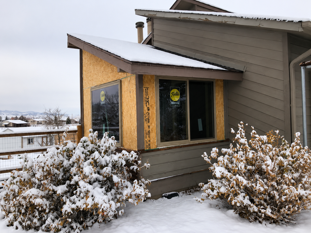 Berthoud, Colorado home with new Pella replacement windows, doors, and siding installed by Northern Lights Exteriors in Berthoud, CO 80513