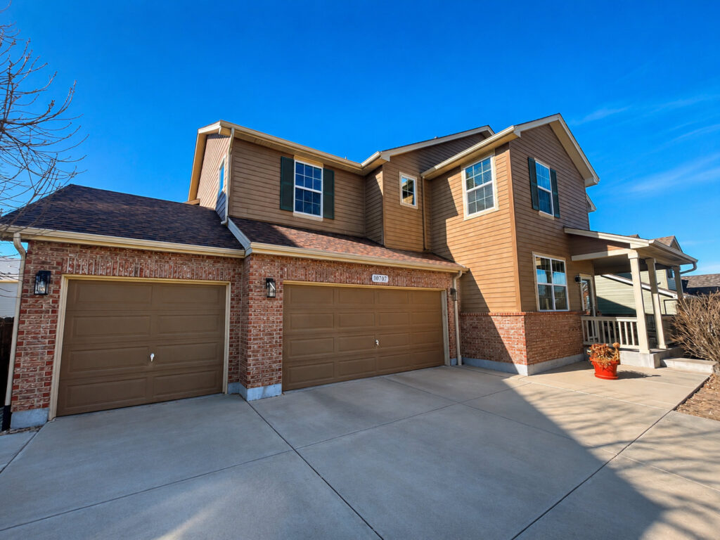 Firestone, Colorado home with new Simonton vinyl replacement windows and siding by Northern Lights Exteriors