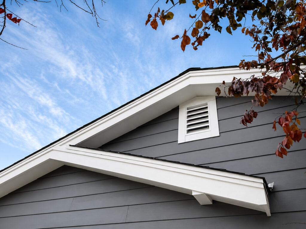 Close-up of James Hardie Slate Gray lap siding with Arctic White trim on a completed Northglenn, CO siding project by Northern Lights Exteriors.